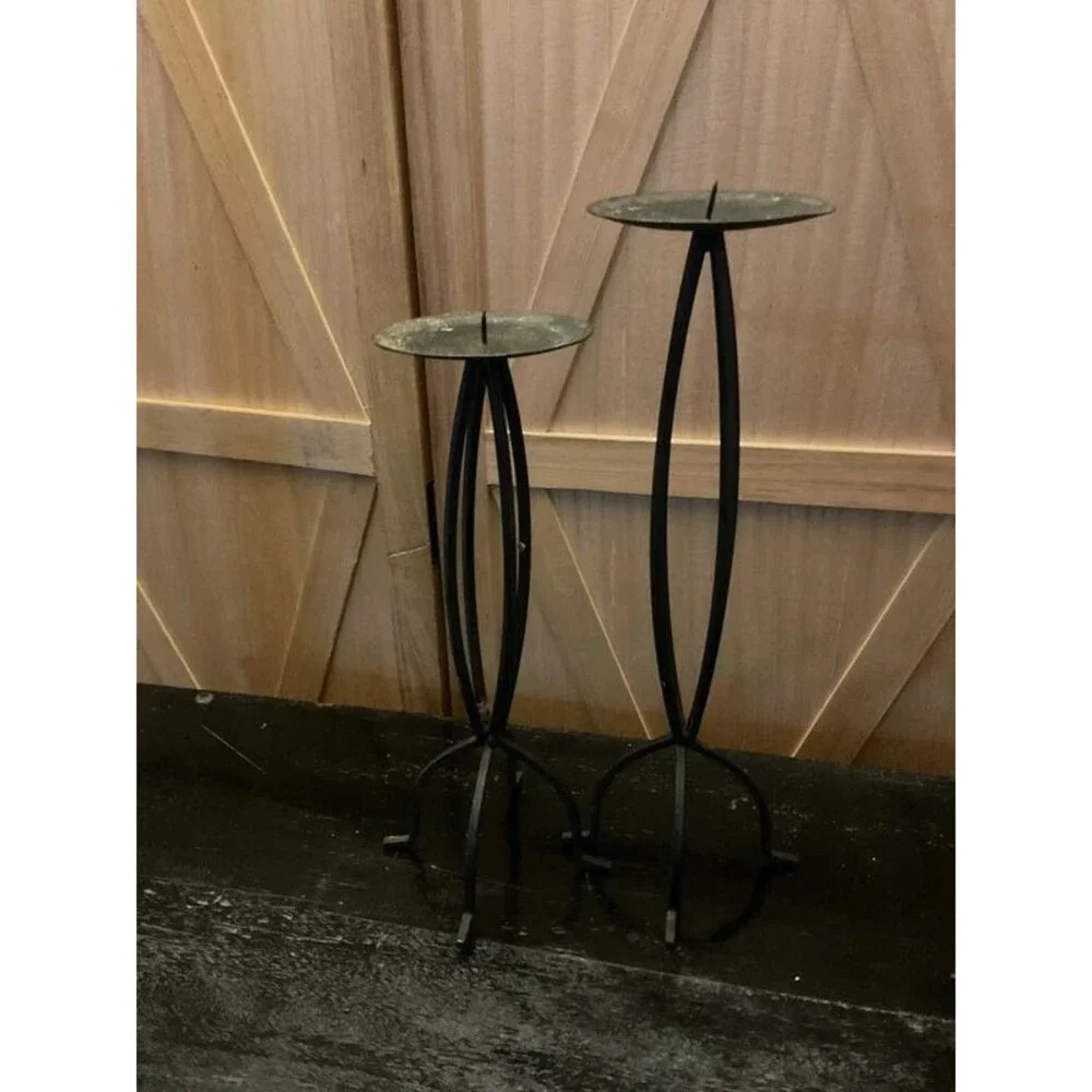 Set of black metal candle holders